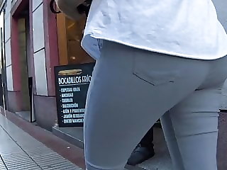 Firm MILF butt in tight grey jeans